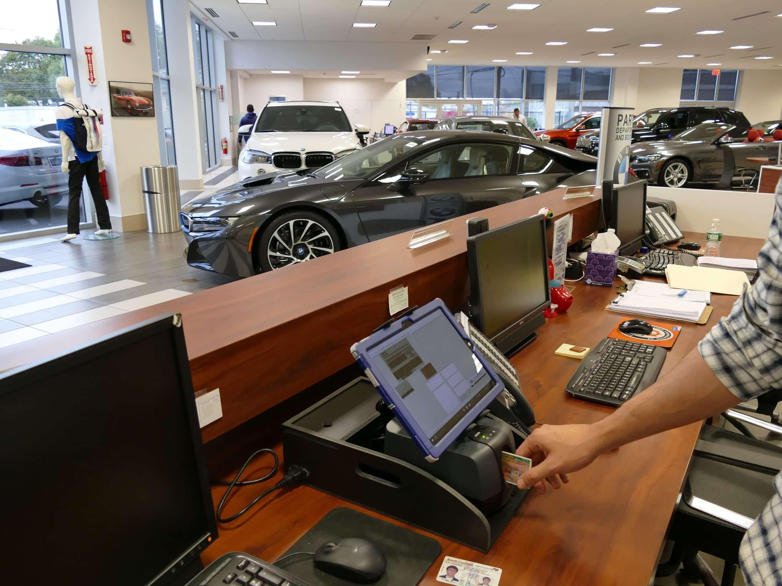 IDentiFake fake ID scanner in operation at car dealership